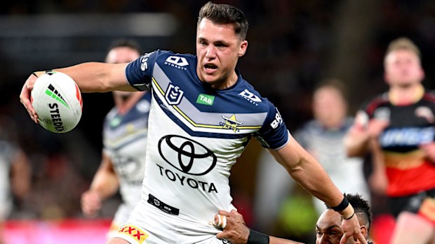 Scott Drinkwater runs the ball for the Cowboys.