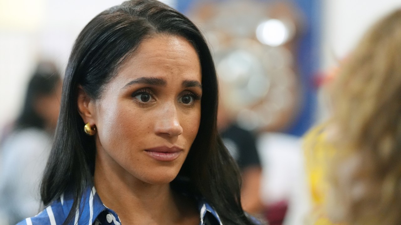 Fans outraged after Meghan Markle leaves retreat after two hours for rugby match with Prince Harry despite $3,199 tickets