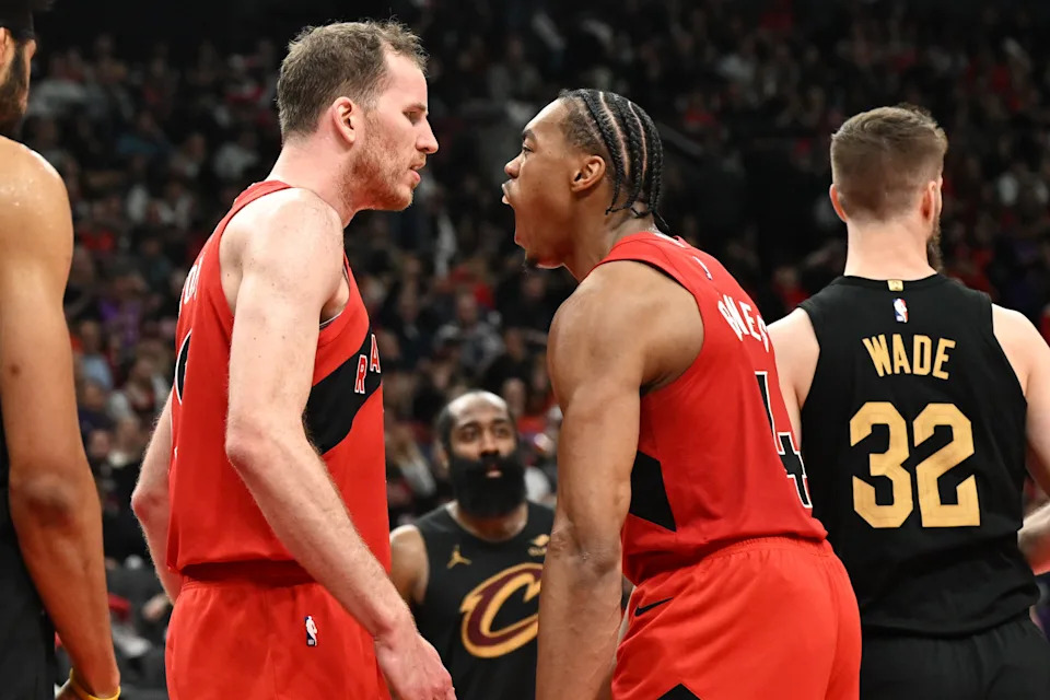 Toronto Raptors forward Scottie Barnes, right, reacts after center Jakob Poeltl scored a basket and earned a foul call against the Cleveland Cavaliers during Game 4 of an NBA first-round playoff series April 26, 2026, in Toronto, Ontario.