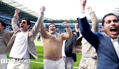 Milton Keynes Dons' owners celebrate their side's promotion to League One