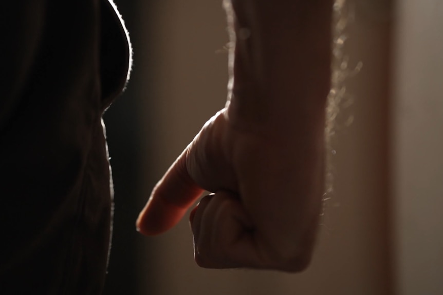 A close up photo of a man's clenched fist.