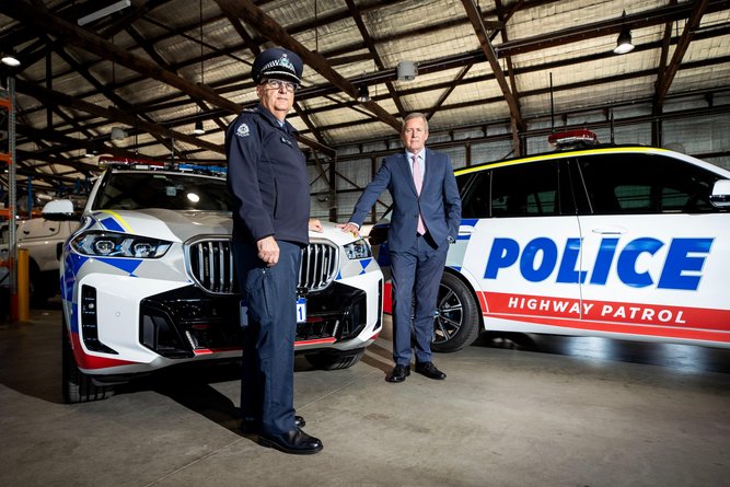 Police and Road Safety Minister Reece Whitby and Comander Mike Peters are pictured with new BMX X5 patrol cars ahead of the Easter long weekend. Picture: Michael Wilson