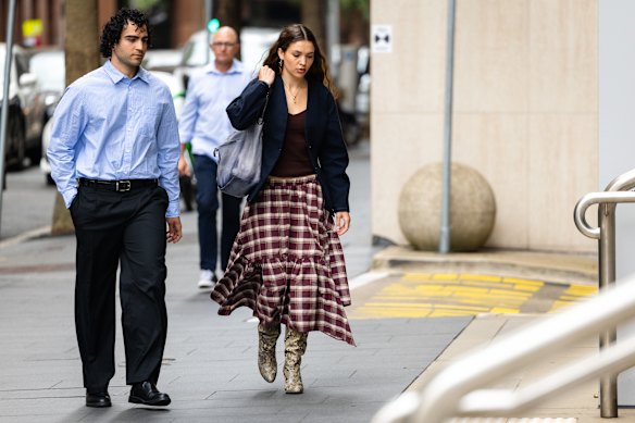 Charlotte MacInnes arrives at the Federal Court in Sydney on Thursday with her boyfriend Carlo Boumouglbay.