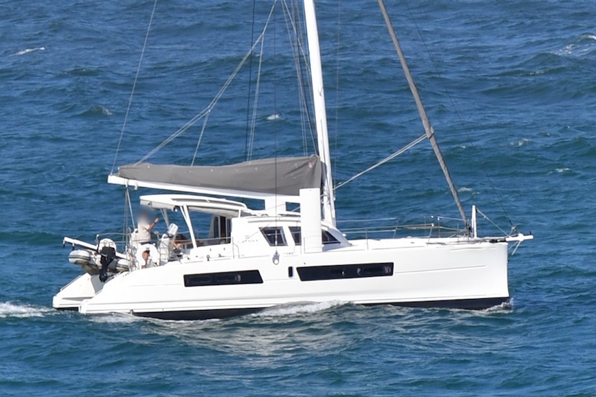 A boat in a blue ocean.