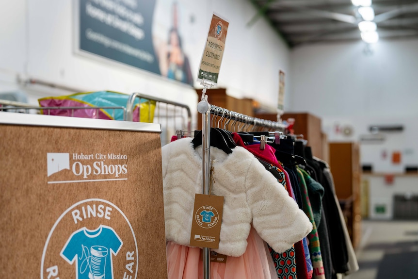 Repaired clothing items on a rack