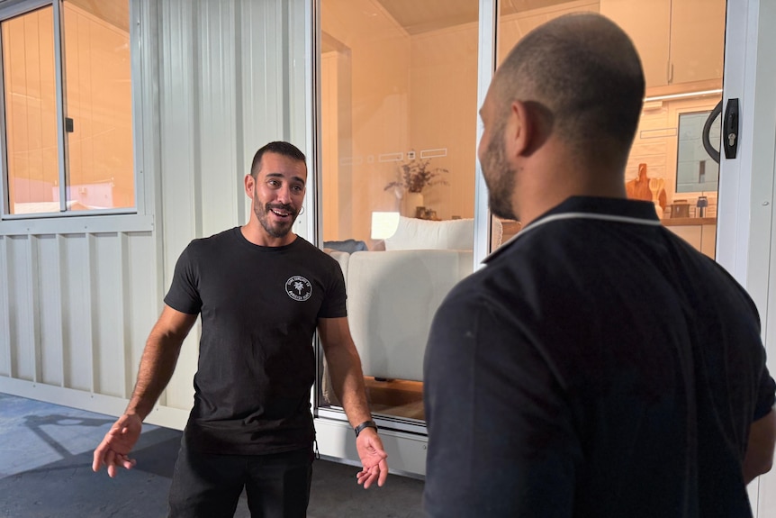 Man smiling at friend