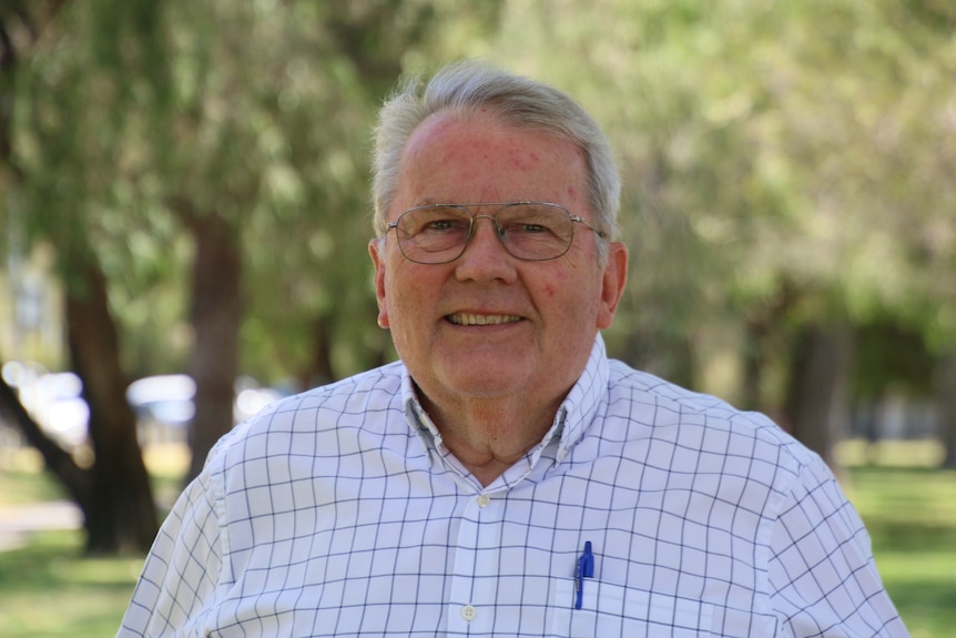 headshot of Tim Treadgold.