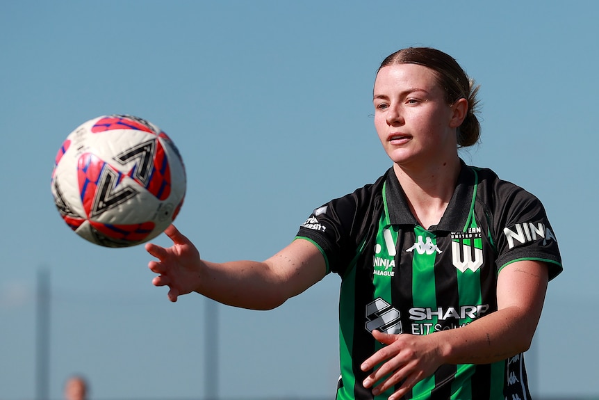 Aimee Medwin of Western United prepares for a throw-in ball