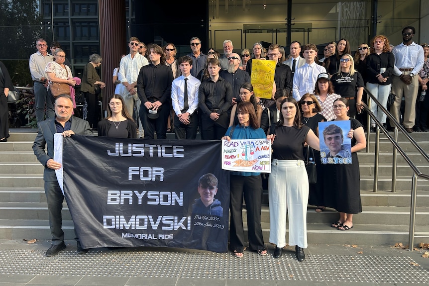Dozens of people outside Newcastle courthouse.