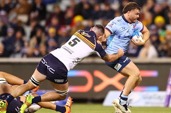  Tom Lambert of the Waratahs in action against the Brumbies