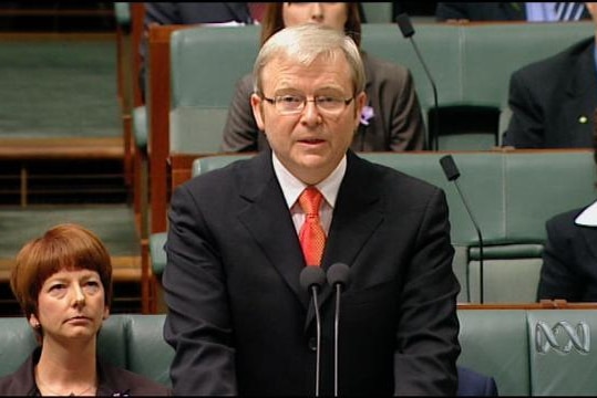 Kevin Rudd stands in House of Representatives.