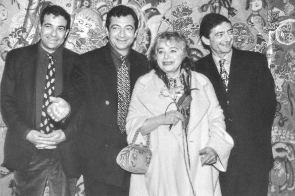 Artist Mirka Mora and her sons (from left) Tiriel, Philippe and William at Heide Museum of Modern Art.