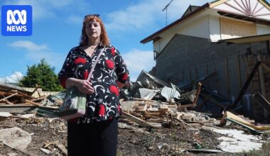 Years after devastating floods, residents watch as former homes demolished