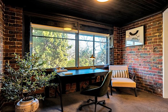 A study nook looking onto Toorak Road is part of the open floor-plan living area.