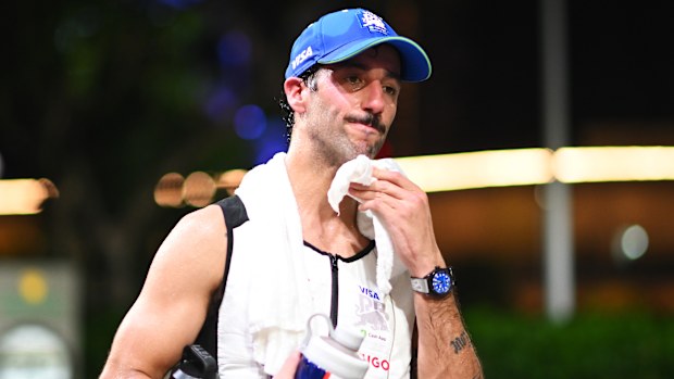 18th Placed Daniel Ricciardo of Australia and Visa Cash App RB looks on in the Paddock after the F1 Grand Prix of Singapore at Marina Bay Street Circuit on September 22, 2024 in Singapore, Singapore. (Photo by Rudy Carezzevoli/Getty Images)