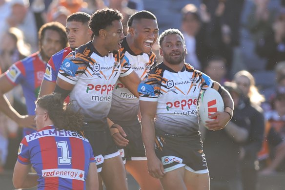 The Tigers are now equal first on the NRL ladder after their powerhouse win over Newcastle.