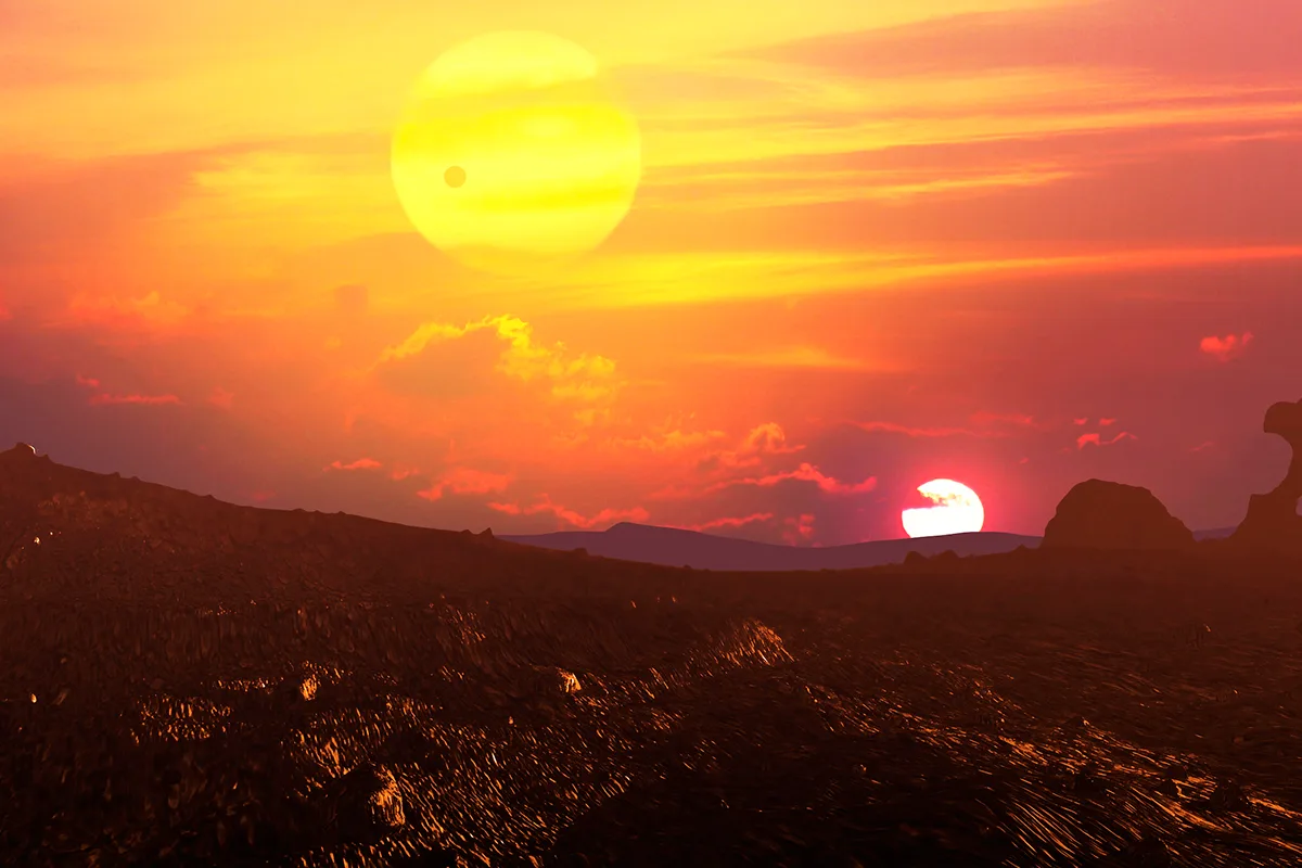 Artist's impression of the view from a planet with a double sunset. Credit: Mark Garlick / Science Photo Library / Getty Images