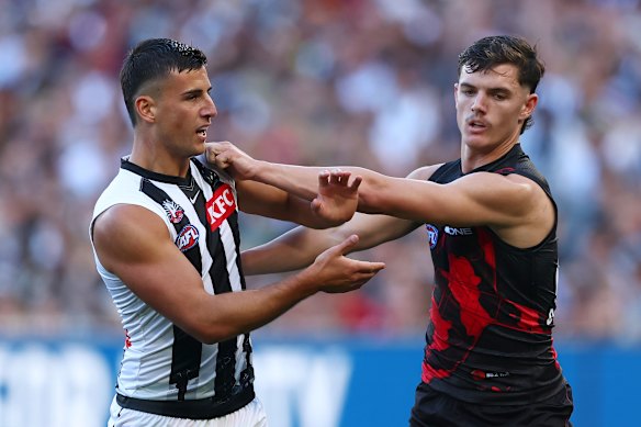 Archie Roberts (right) and the Bombers had a dirty day against Nick Daicos and the Pies.