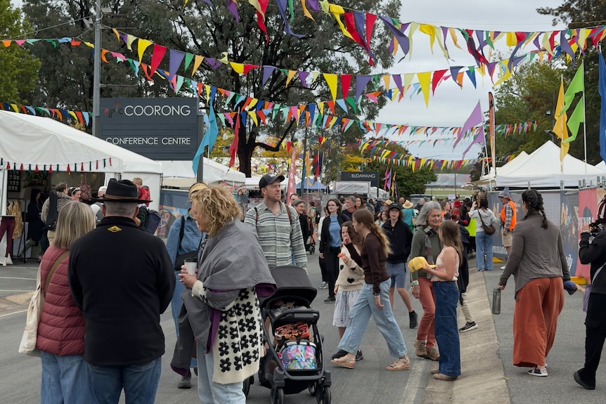 A crowd of people at a festival.