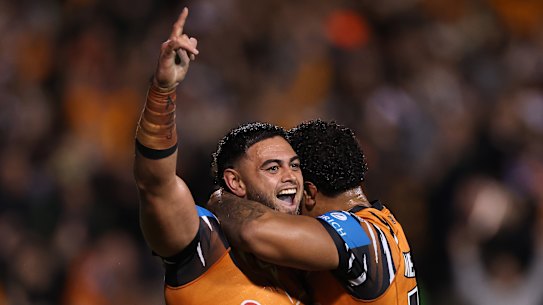 Royce Hunt celebrates his late try.