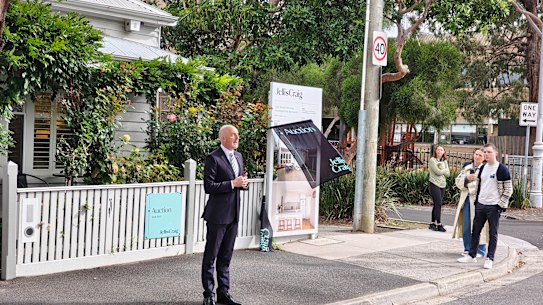 Jellis Craig Richmond auctioneer Luke Schickerling calls for bids at 266 Mary Street.