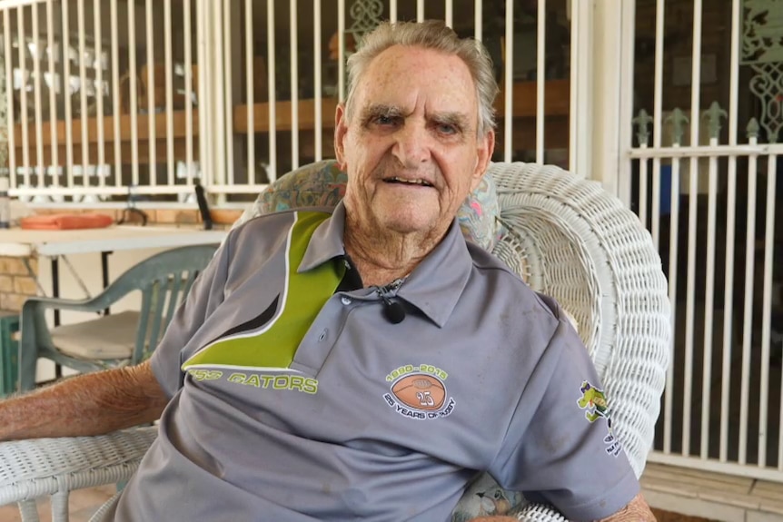 A man in a shirt, looking at the camera