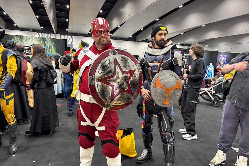 Two men cosplaying as comic book characters