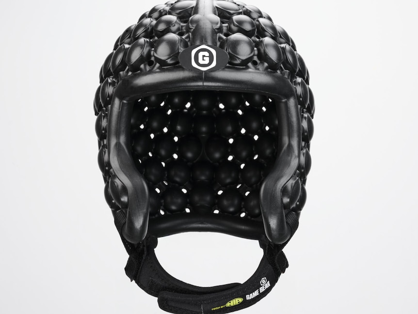 A black padded sports helmet on a white background.