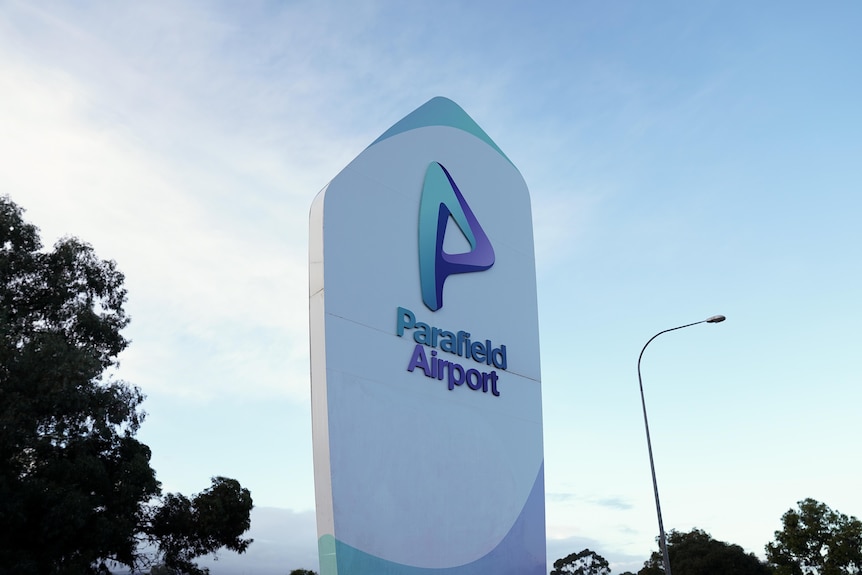 A sign that says "Parafield Airport".