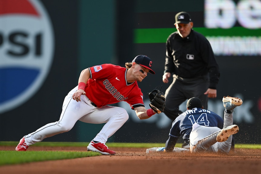 Travis Bazzana fields for the Guardians against the Rays.