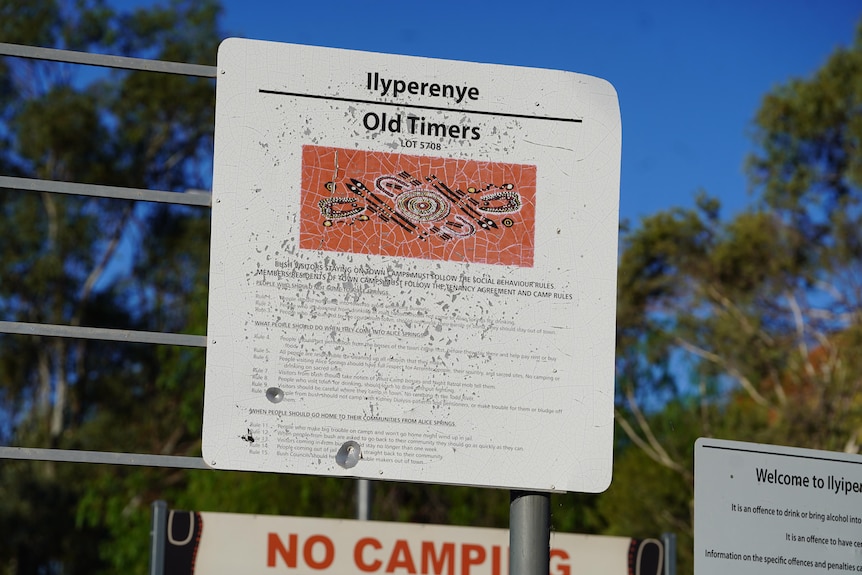An old sign for an Aboriginal town camp 