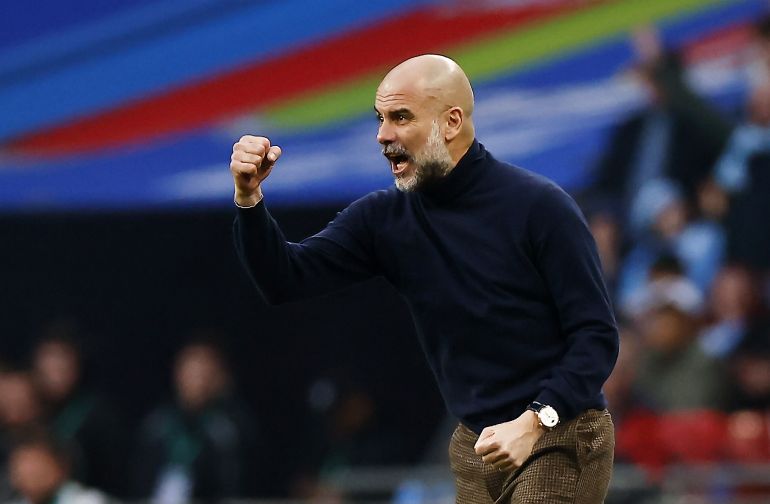 epa12841971 Manchester City manager Pep Guardiola celebrates after his team scored the opening goal during the Carabao Cup final match between Arsenal FC and Manchester City FC, in London, Great Britain, 22 March 2026. EPA/TOLGA AKMEN EDITORIAL USE ONLY. No use with unauthorized audio, video, data, fixture lists, club/league logos, 'live' services or NFTs. Online in-match use limited to 120 images, no video emulation. No use in betting, games or single club/league/player publications.