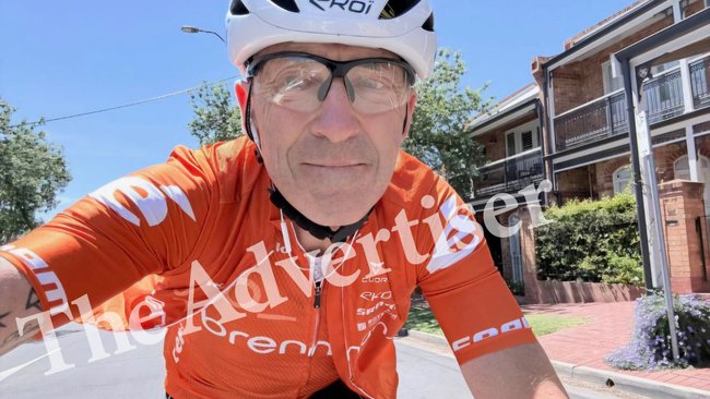 Shane Johnson has been fined for using his mobile to take a photo of himself while cycling