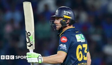 Jos Buttler salutes the crowd after reaching fifty for Gujarat Titans
