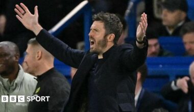 Man Utd manager Michael Carrick holds his arms out