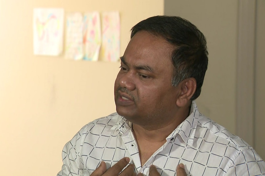 Sanjoy Dar speaks to reporters.