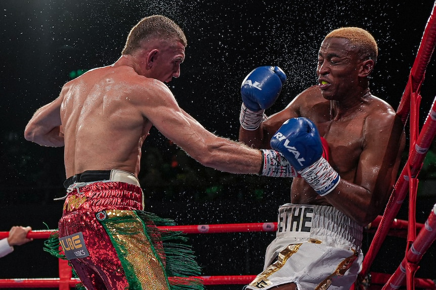 Conor Wallace lands a body shot