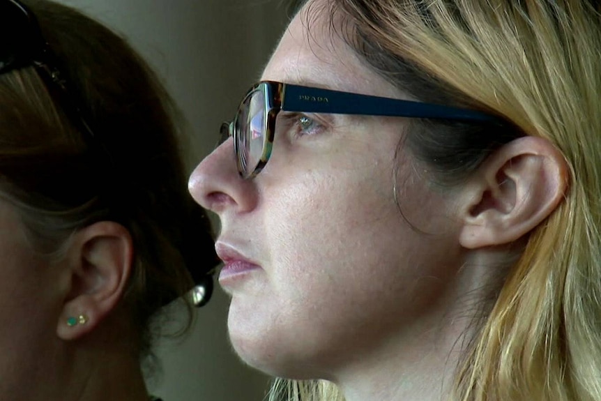 A close-up of Lisa Lines in side profile.