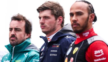 Max Verstappen and Fernando Alonso stand next to Lewis Hamilton