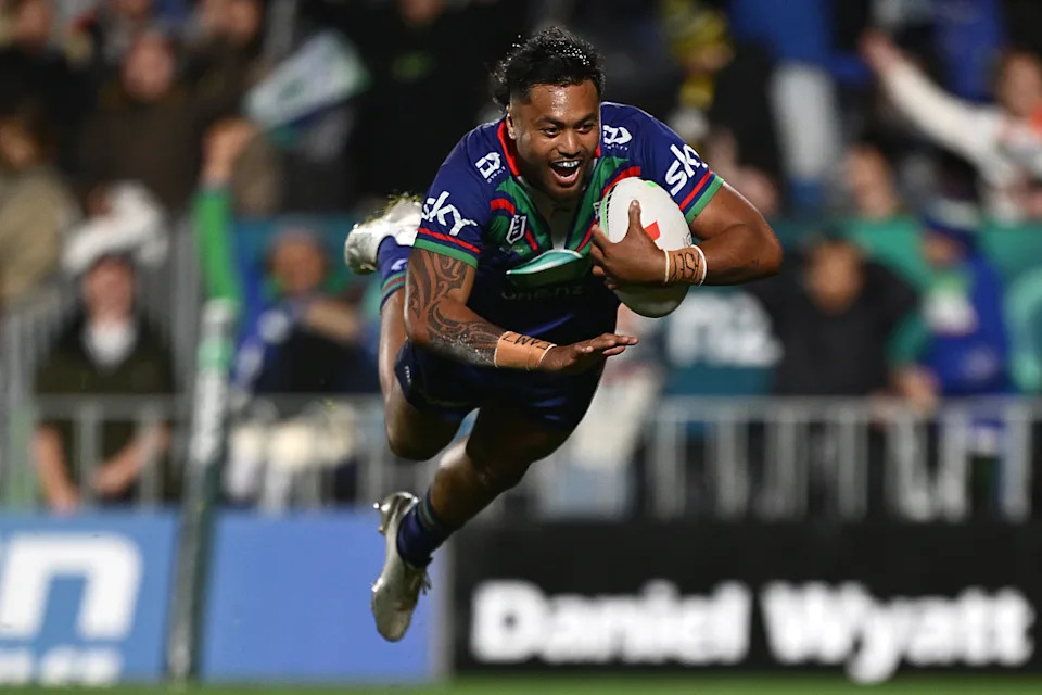 Adam Pompey jumps for a try.