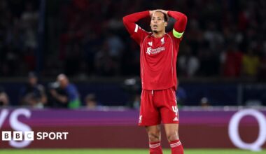 Liverpool's players react after losing to Paris St-Germain in the Champions League