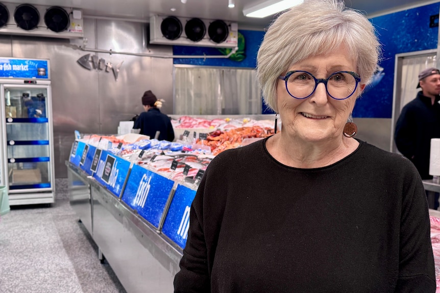 Woman in seafood shop