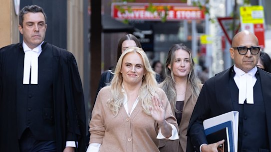 Rebel Wilson and her legal team, barristers Tim Senior, left, and Dauid Subtain, SC, right.