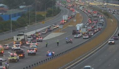Perth traffic: Motorbike rider fighting for life after getting trapped under car in Tonkin Highway crash
