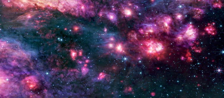 Pink and purple infrared images of dust in Sagittarius B2 captured by JWST