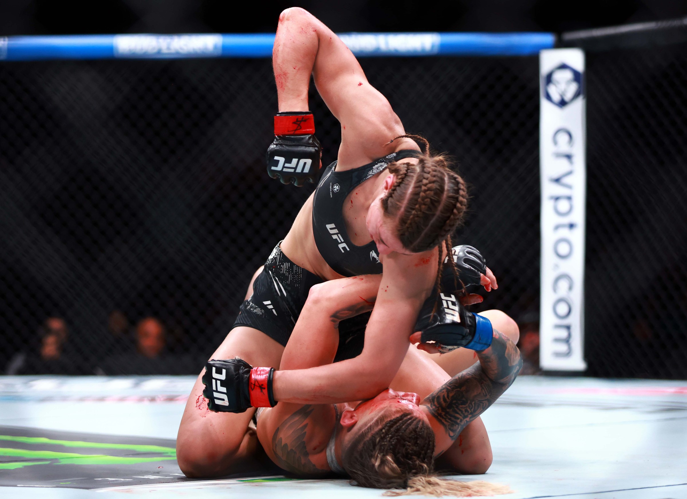 TORONTO, ON - JANUARY 20: Jasmine Jasudavicius of Canada fights against Priscila Cachoeira of Brazil in a bantamweight bout during the UFC 297 event at Scotiabank Arena on January 20, 2024 in Toronto, Ontario, Canada. (Photo by Vaughn Ridley/Getty Images)