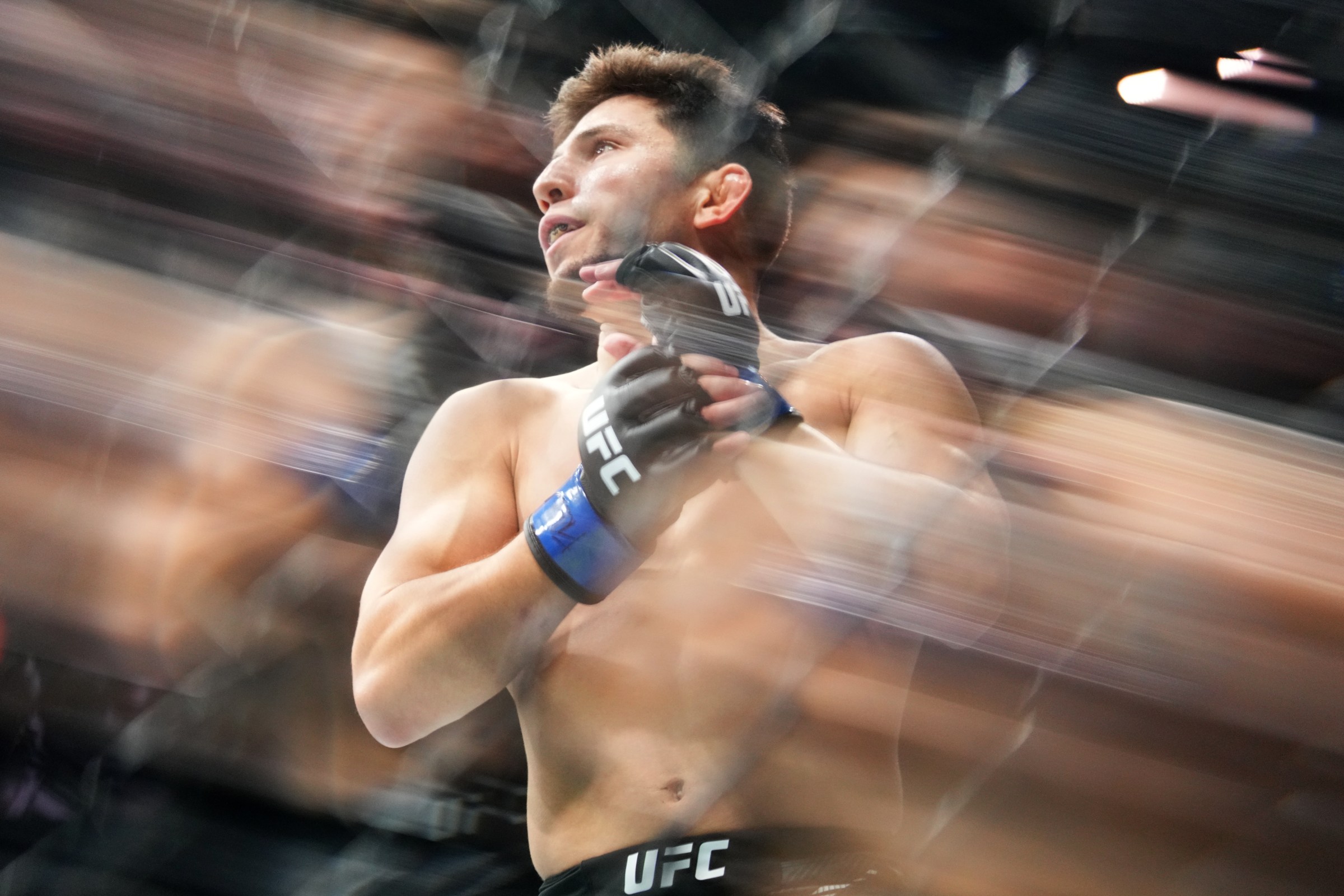 ABU DHABI, UNITED ARAB EMIRATES - OCTOBER 25: (Editors Note: Image was taken using a Prism FX lens filter) Mitch Raposo prepares to face Azat Maksum of Kazakstan in a flyweight fight during the UFC 321 event at Etihad Arena on October 25, 2025 in Abu Dhabi, United Arab Emirates. (Photo by Jeff Bottari/Zuffa LLC)