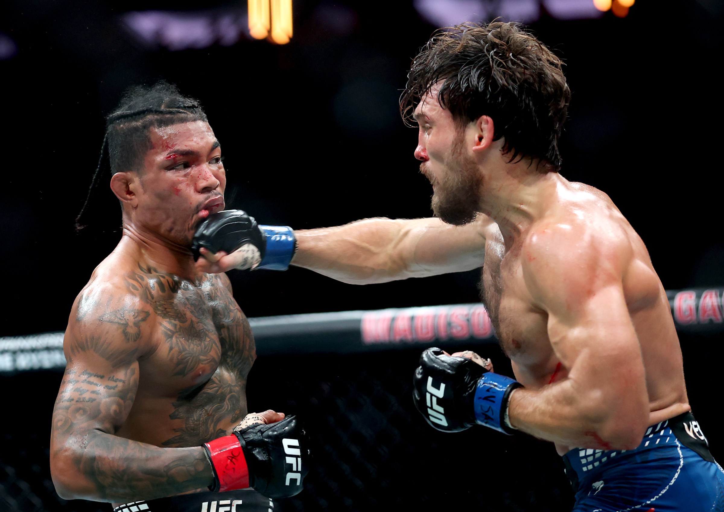 NEW YORK, NEW YORK - NOVEMBER 15: Ethyn Ewing of the United States (R) punches Malcolm Wellmaker of the United States during UFC 322 at Madison Square Garden on November 15, 2025 in New York City. (Photo by Ishika Samant/Getty Images)