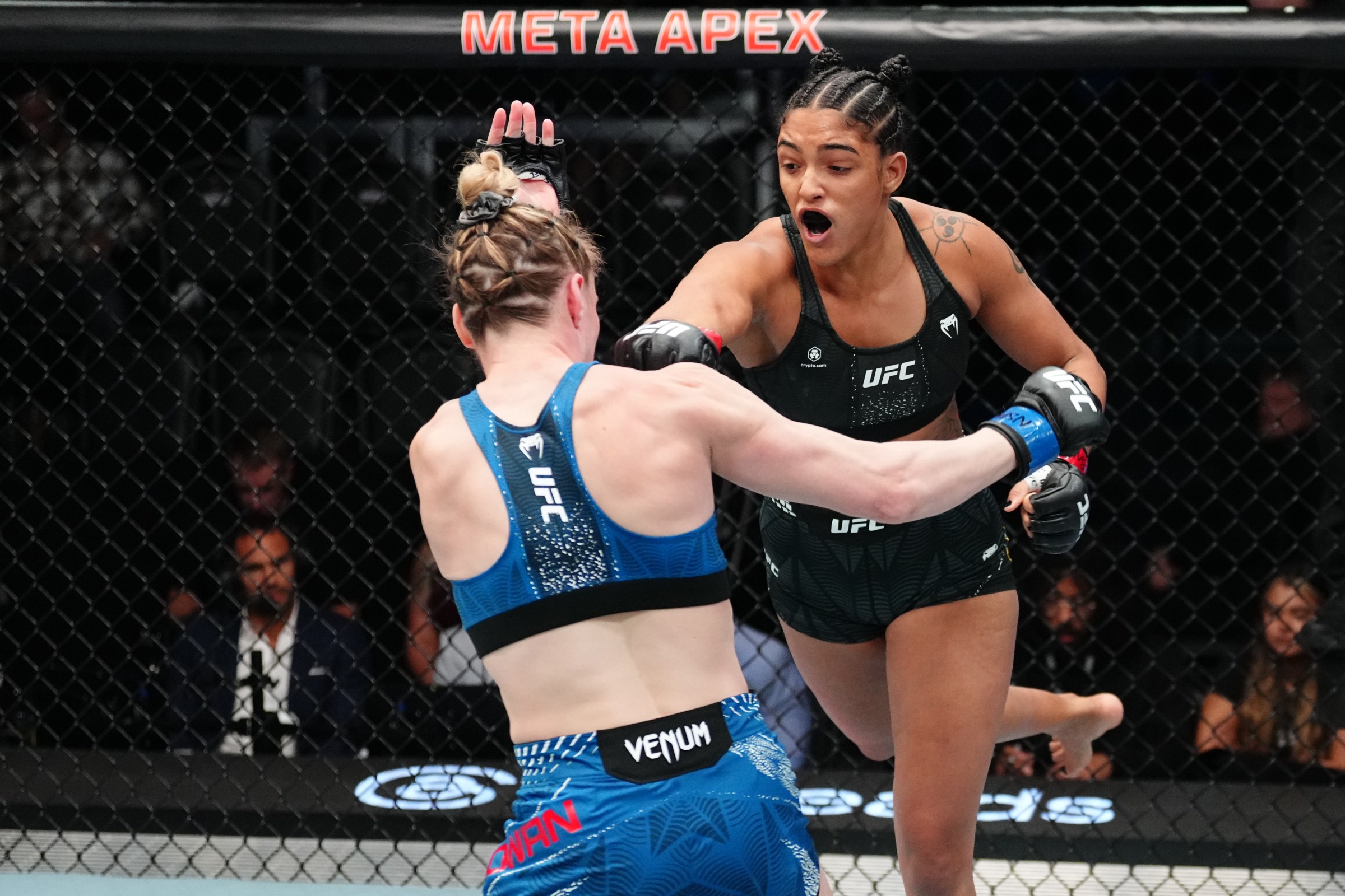 LAS VEGAS, NEVADA - APRIL 04: (R-L) Alice Pereira of Brazil punches Hailey Cowan in a bantamweight fight during the UFC Fight Night event at Meta APEX on April 04, 2026 in Las Vegas, Nevada. (Photo by Jeff Bottari/Zuffa LLC)
