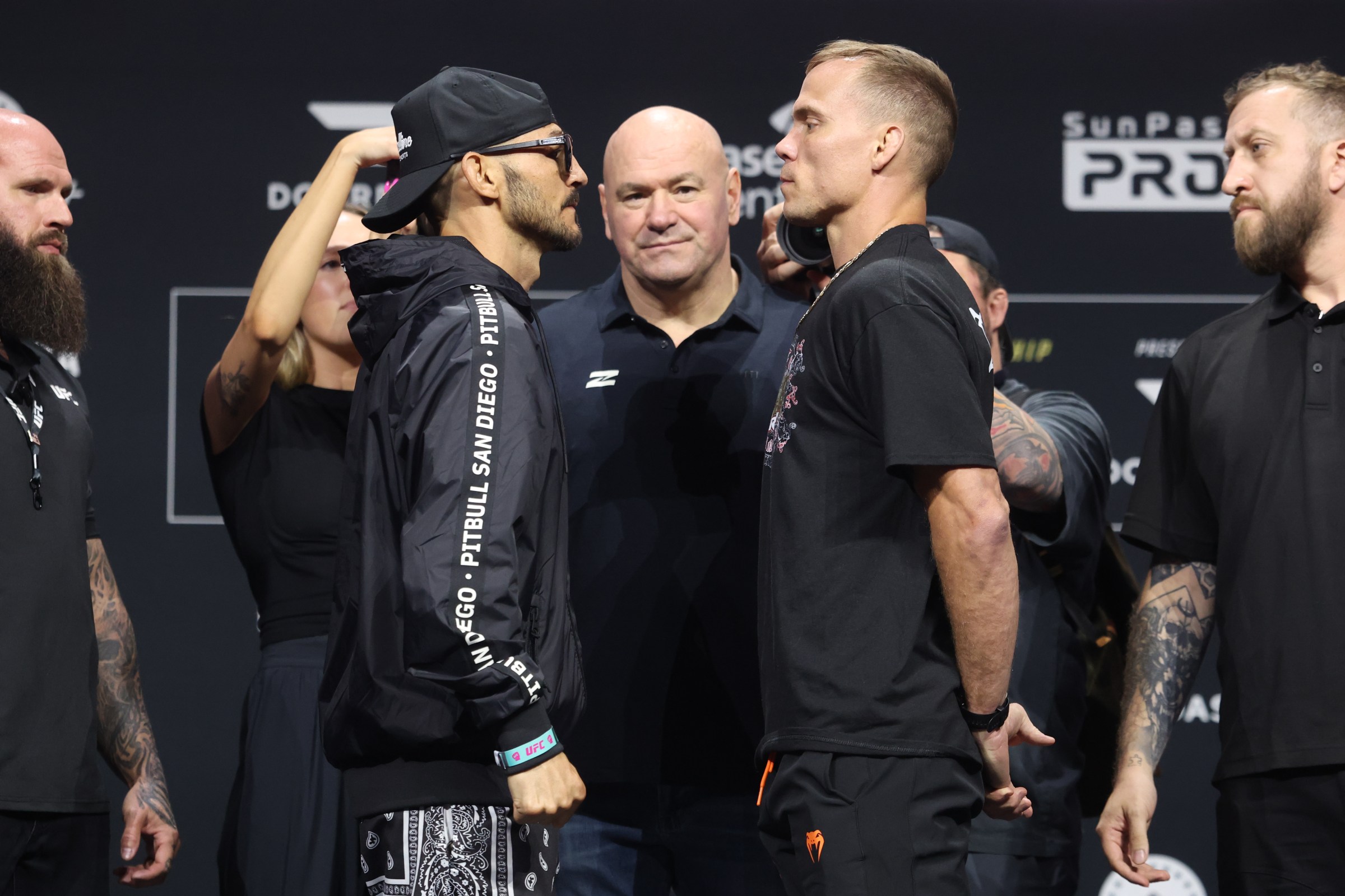 MIAMI, FLORIDA - APRIL 09: (L-R) Opponents Cub Swanson and Nate Landwehr face off during the UFC 327 press conference at Kaseya Center on April 09, 2026 in Miami, Florida. (Photo by Ed Mulholland/Zuffa LLC)